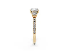 Cushion Cut Diamond Three-Stone Ring Set in Yellow gold with Pavé Band and Graduated Sides