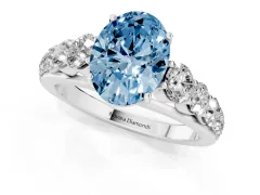 Fancy Blue Oval Cut Diamond Solitaire Ring Set in White gold with Pavé-Set Band and Prong Setting