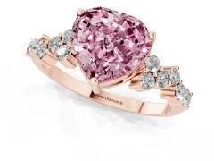 Fancy Pink Heart Cut Diamond Ring Set in Rose gold with Scattered Round Accents
