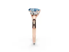 Fancy Blue Pear Cut Diamond Three-Stone Ring Set in Rose gold with Bold Center and Classic Band