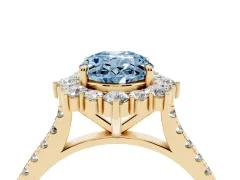 Fancy Blue Oval Cut Diamond Halo Ring Set in Yellow gold with Pavé Band and Prong Setting