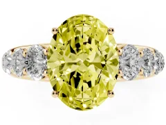 Fancy Yellow Oval Cut Diamond Solitaire Ring Set in Yellow gold with Pavé-Set Band and Prong Setting