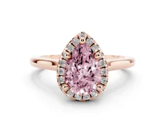 Fancy Pink Pear Cut Diamond Halo Engagement Ring Set in Rose gold with Pavé Band and Rising Shoulders