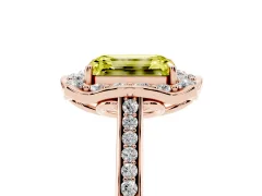Fancy Yellow Emerald Cut Diamond Halo Ring Set in Rose gold with Pavé-Lined Shoulders and Prong Setting