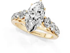 Marquise Cut Diamond Solitaire Ring Set in Yellow gold with Pavé-Set Band and Prong Setting