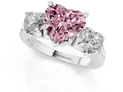 Fancy Pink Heart Cut Diamond Three-Stone Trellis Ring Set in White gold with Comfort Fit Band