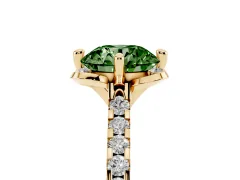 Fancy Green Round Cut Diamond Solitaire Ring Set in Yellow gold with Pavé Band and Floral Prong Setting