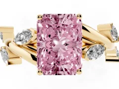 Fancy Pink Radiant Cut Diamond Solitaire Ring Set in Yellow gold with Twisted Marquise Accent Band