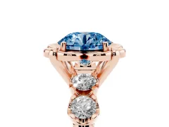 Fancy Blue Round Cut Diamond Floral Halo Ring Set in Rose gold with Shared Prong Band