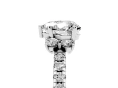 Heart Cut Diamond Three-Stone Pavé Ring Set in Platinum with Prong Setting