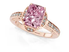 Fancy Pink Radiant Cut Diamond Halo Ring Set in Rose gold with Channel Set Band and Prong Setting