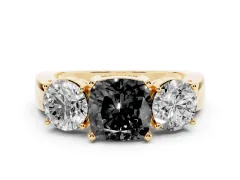 Fancy Black Cushion Cut Diamond Three-Stone Ring Set in Yellow gold with Round Side Stones and Classic Band
