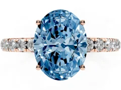 Fancy Blue Oval Cut Diamond Pavé Solitaire Engagement Ring Set in Rose gold with Prong Setting