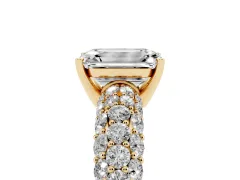 Emerald Cut Diamond Pavé Band Solitaire Ring Set in Yellow gold with Close-Set Accent Stones and Prong Setting