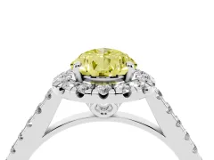 Fancy Yellow Pear Cut Diamond Pavé Halo Engagement Ring Set in Platinum with Pavé Band and Prong Setting