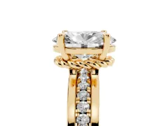Oval Cut Diamond Solitaire Ring Set in Yellow gold with Channel Set Band and Prong Setting