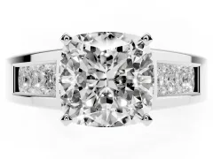 Cushion Cut Diamond Solitaire Ring Set in Platinum with Channel-Set Accent Stones and Prong Setting