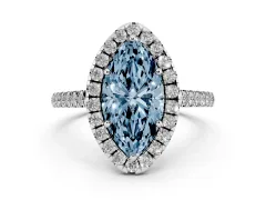 Fancy Blue Marquise Cut Diamond Pavé Halo Engagement Ring Set in Platinum with Pavé Band and Prong Setting