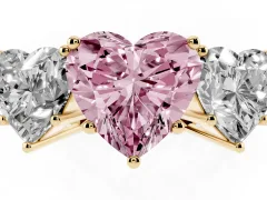 Fancy Pink Heart Cut Diamond Three-Stone Ring Set in Yellow gold with Textured Band