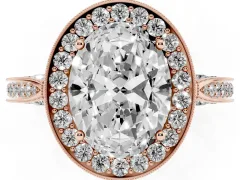 Oval Cut Diamond Halo Engagement Ring Set in Rose gold with Accent Split Shank Band