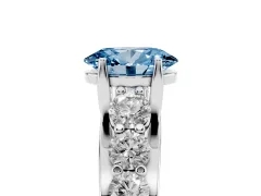 Fancy Blue Oval Cut Diamond Pavé Engagement Ring Set in Silver with Prong Setting