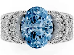 Fancy Blue Oval Cut Diamond Milgrain Halo Pavé Engagement Ring Set in White gold with Prong Setting