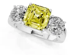 Fancy Yellow Asscher Cut Diamond Three-Stone Ring Set in Silver with Round Side Stones and Classic Band