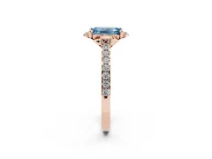 Fancy Blue Emerald Cut Diamond Solitaire Ring Set in Rose gold with Pavé Band and Floral Prong Setting