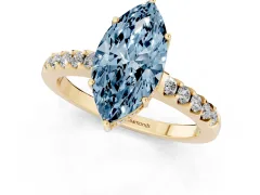 Fancy Blue Marquise Cut Diamond Solitaire Engagement Ring Set in Yellow gold with Pavé Band and Prong Setting