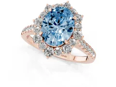 Fancy Blue Oval Cut Diamond Halo Ring Set in Rose gold with Pavé Band and Prong Setting