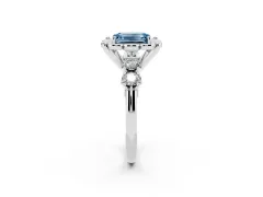 Fancy Blue Emerald Cut Diamond Floral Halo Ring Set in White gold with Shared Prong Band