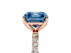 Fancy Blue Asscher Cut Diamond Solitaire Engagement Ring Set in Rose gold with Round Pavé Band and Prong Setting