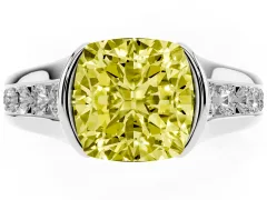Fancy Yellow Cushion Cut Diamond Bezel-Set Solitaire Ring Set in White gold with Channel-Set Band