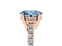 Fancy Blue Oval Cut Diamond Solitaire Ring Set in Rose gold with Brilliant Pavé Band and Prong Setting