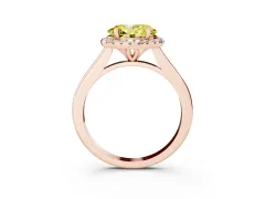 Fancy Yellow Oval Cut Diamond Halo Engagement Ring Set in Rose gold with Pavé Band and Rising Shoulders