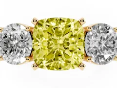 Fancy Yellow Cushion Cut Diamond Three-Stone Ring Set in Yellow gold with Round Side Stones and Classic Band