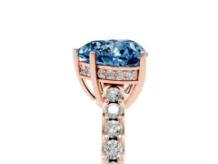 Fancy Blue Heart Cut Diamond Solitaire Engagement Ring Set in Rose gold with Pavé Band and Prong Setting