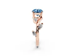 Fancy Blue Round Cut Diamond Solitaire Ring Set in Rose gold with Twisted Marquise Accent Band