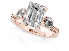 Fancy Yellow Emerald Cut Diamond Three-Stone Ring Set in Rose gold with Pavé Band and Smaller Side Stones