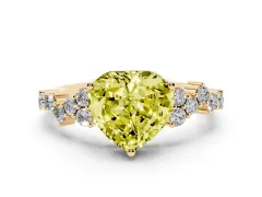 Fancy Yellow Heart Cut Diamond Ring Set in Yellow gold with Scattered Round Accents