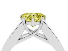 Fancy Yellow Heart Cut Diamond Solitaire Ring Set in White gold with Channel-Set Accent Stones and Prong Setting