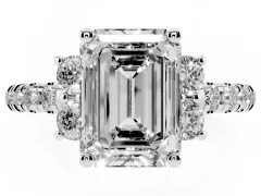 Emerald Cut Diamond Three-Stone Pavé Ring Set in White gold with Prong Setting