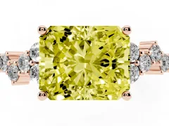 Fancy Yellow Radiant Cut Diamond Ring Set in Rose gold with Scattered Round Accents