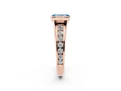 Fancy Blue Emerald Cut Diamond Bezel-Set Solitaire Ring Set in Rose gold with Channel-Set Band
