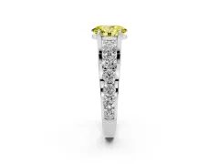 Fancy Yellow Oval Cut Diamond Pavé Engagement Ring Set in Silver with Prong Setting