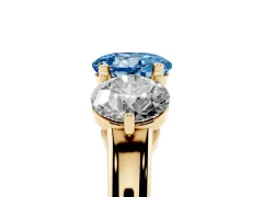 Fancy Blue Round Cut Diamond Three-Stone Ring Set in Yellow gold with Prong Setting and Plain Band