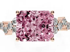 Fancy Pink Radiant Cut Diamond Ring Set in Rose gold with Scattered Round Accents