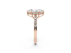 Marquise Cut Diamond Solitaire Engagement Ring Set in Rose gold with Pavé Band and Prong Setting