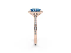 Fancy Blue Radiant Cut Diamond Halo Engagement Ring Set in Rose gold with Round Pavé Shoulders and Heart Gallery
