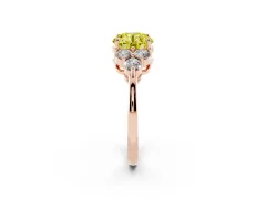 Fancy Yellow Round Cut Diamond Solitaire Ring Set in Rose gold with Cluster Accents on Each Side